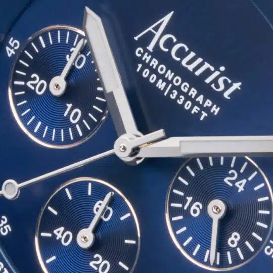 Accurist — close-up of a blue chronograph watch dial.