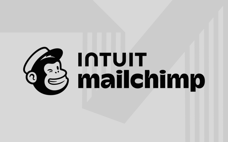Inuit Mailchimp logo featuring a playful monkey sitting on top of it.