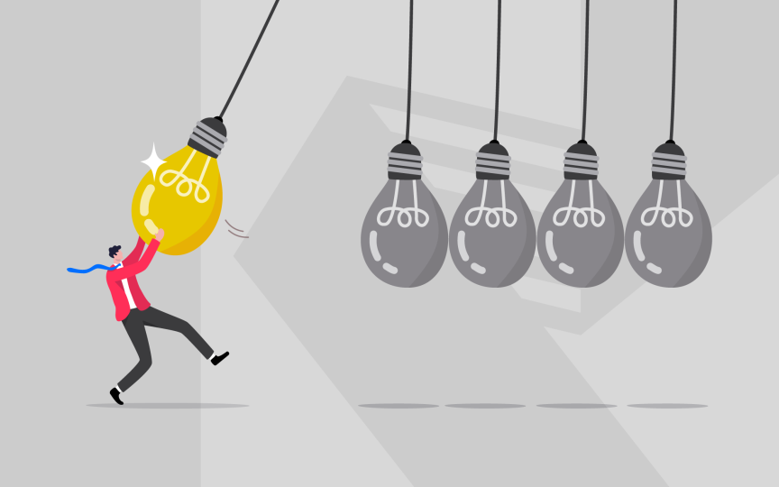 Person swinging lightbulbs in Newton cradle.