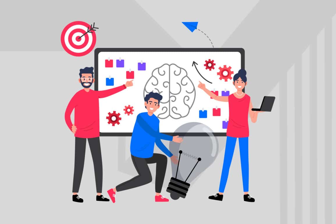 Team presenting ideas and collaborative processes around a digital whiteboard.