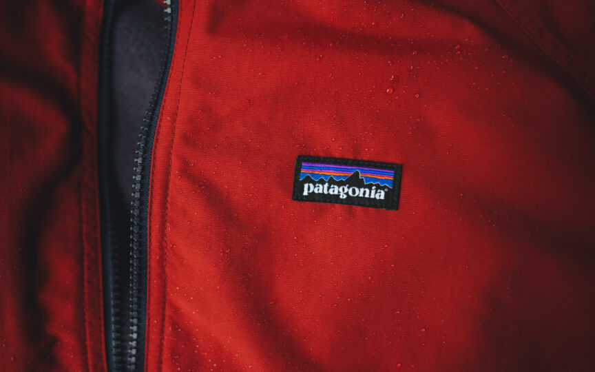 Patagonia logo displayed prominently on a red jacket, showcasing the brand's outdoor apparel design.